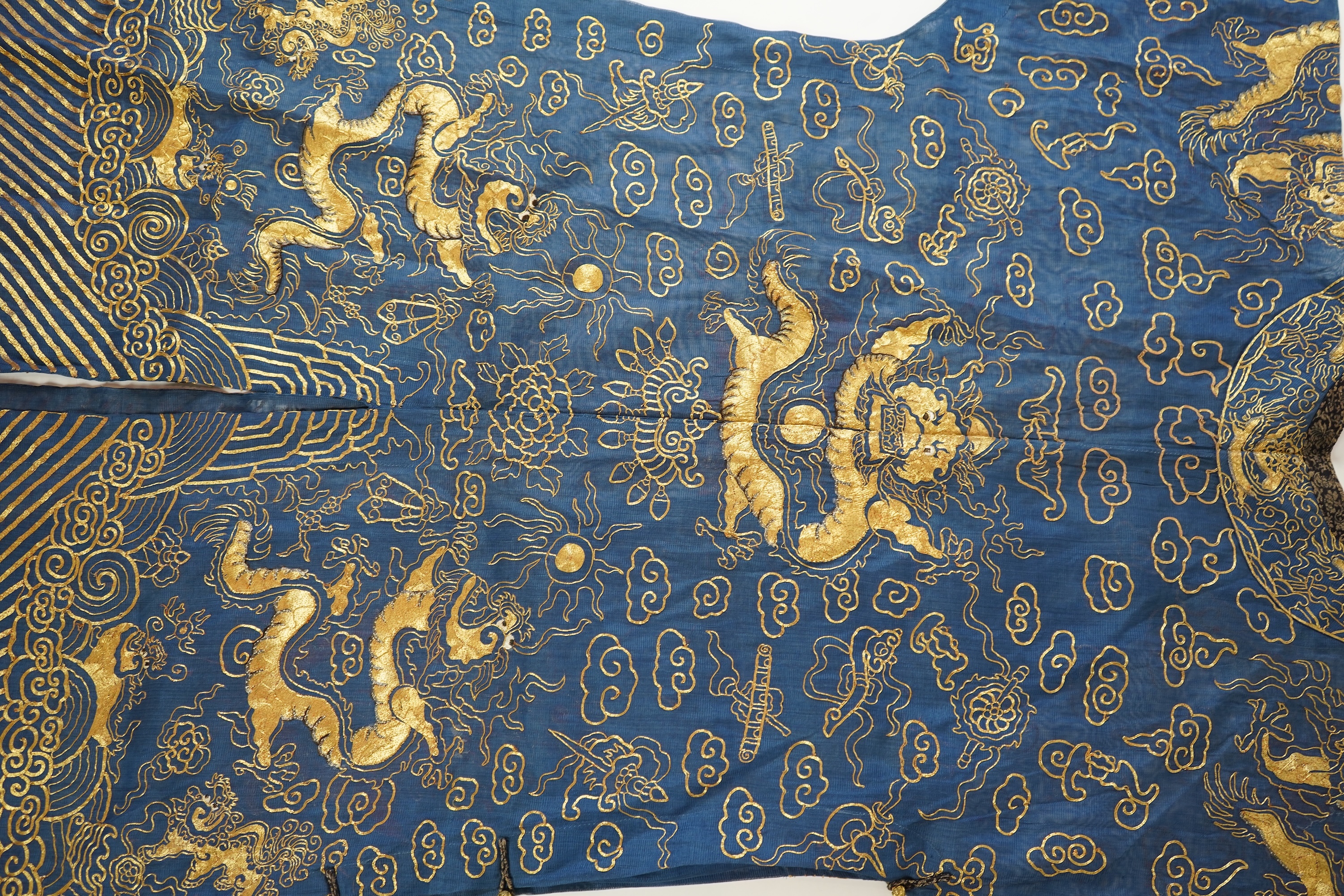 A Chinese gold thread and silk gauze ‘dragon’ summer robe, jifu, early 20th century